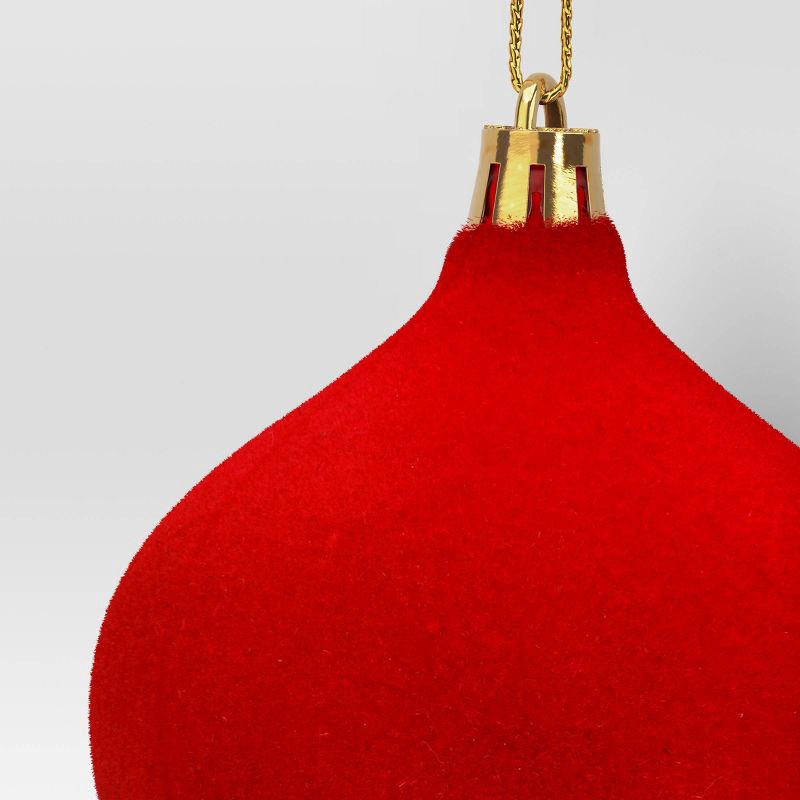 slide 3 of 3, Christmas Onion Shaped Flocked Dark Red Ornament with Green Tassle - Wondershop™, 1 ct