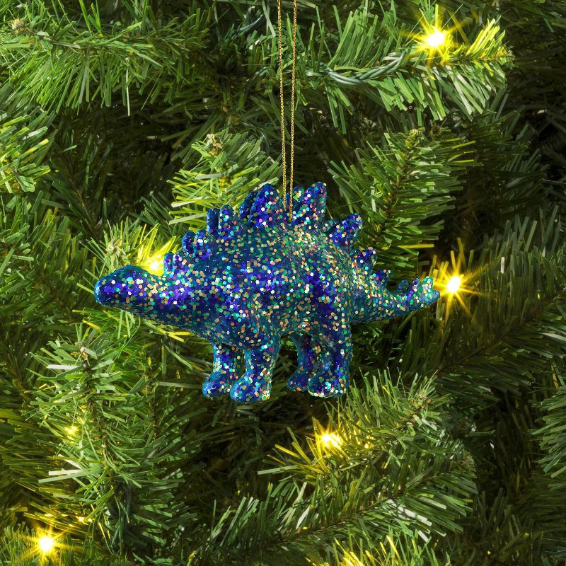 slide 2 of 3, 5" Christmas Plastic Chunky Glitter Dinosaur Ornament Blue - Wondershop™, 1 ct