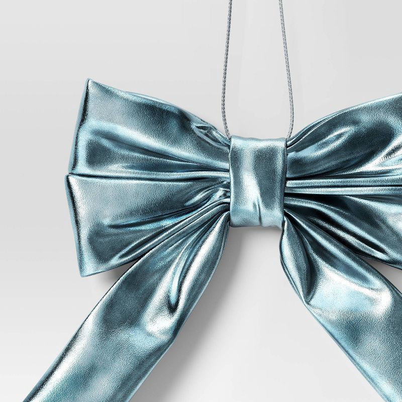 slide 3 of 3, 6.75" Christmas Metallic Bow Ornament Teal - Wondershop™, 1 ct