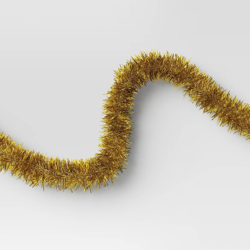 slide 3 of 3, 10' Christmas Soft and Silky Tinsel Garland Champagne Gold - Wondershop™, 1 ct