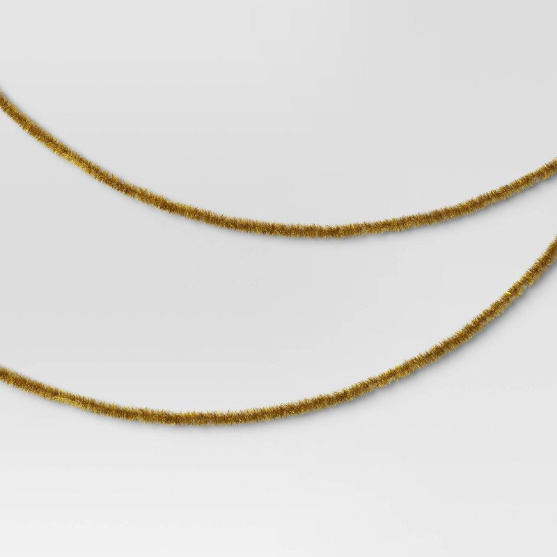 slide 1 of 3, 10' Christmas Soft and Silky Tinsel Garland Champagne Gold - Wondershop™, 1 ct