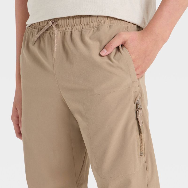 slide 3 of 3, Boys' Lined Woven Pants - All In Motion™ Tan M, 1 ct