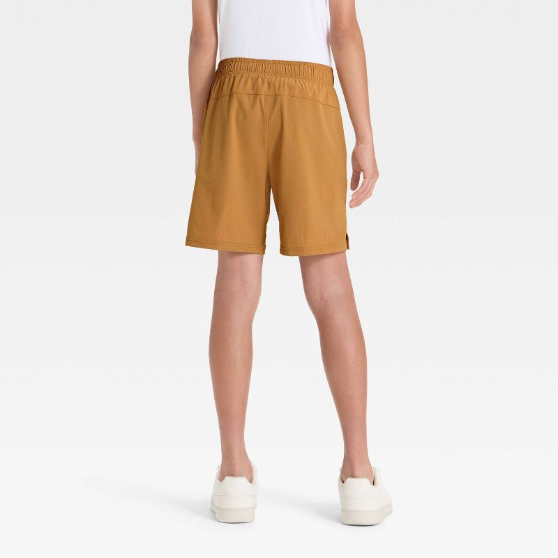 slide 2 of 3, Boys' Soft Stretch Woven Shorts - All In Motion™ Cinnamon M, 1 ct