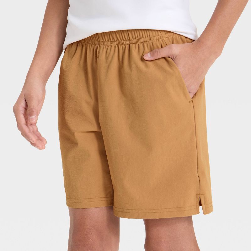 slide 3 of 3, Boys' Soft Stretch Woven Shorts - All In Motion™ Cinnamon M, 1 ct