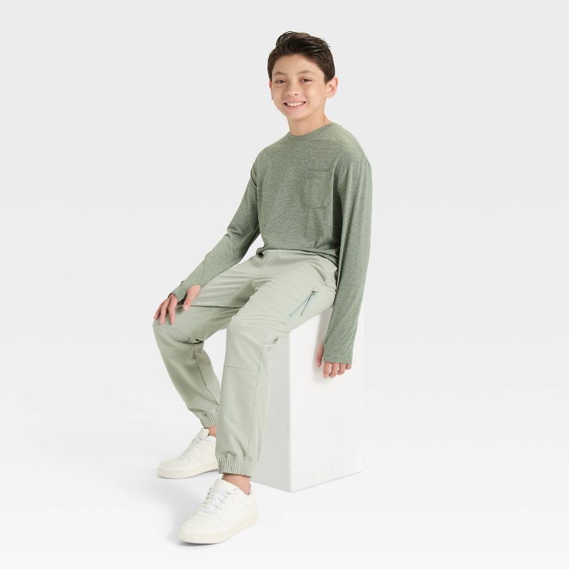 slide 3 of 3, Boys' Lined Woven Pants - All In Motion™ Light Green S, 1 ct