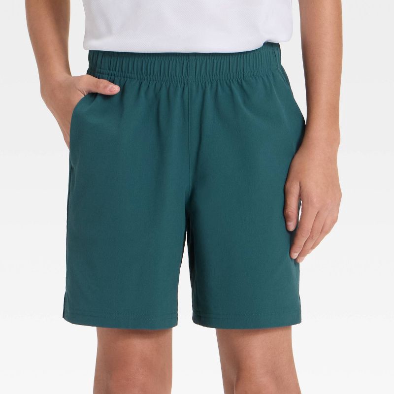 slide 2 of 3, Boys' Soft Stretch Woven Shorts - All In Motion™ Teal Green L, 1 ct