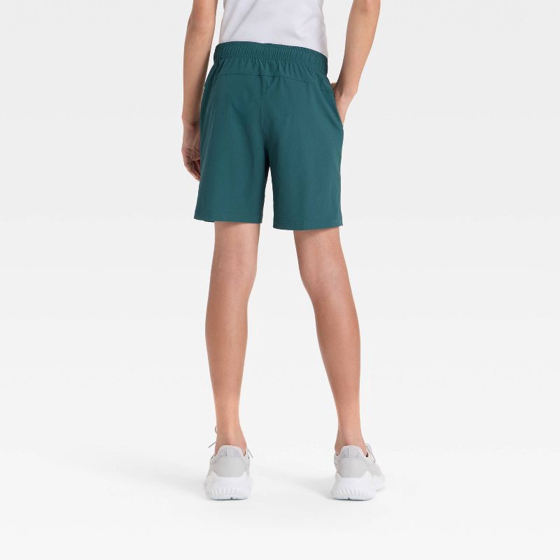 slide 2 of 3, Boys' Soft Stretch Woven Shorts - All In Motion™ Teal Green XL, 1 ct