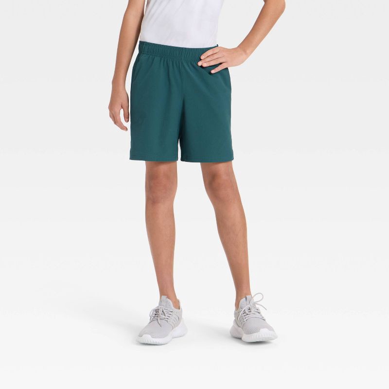 slide 1 of 3, Boys' Soft Stretch Woven Shorts - All In Motion™ Teal Green XL, 1 ct