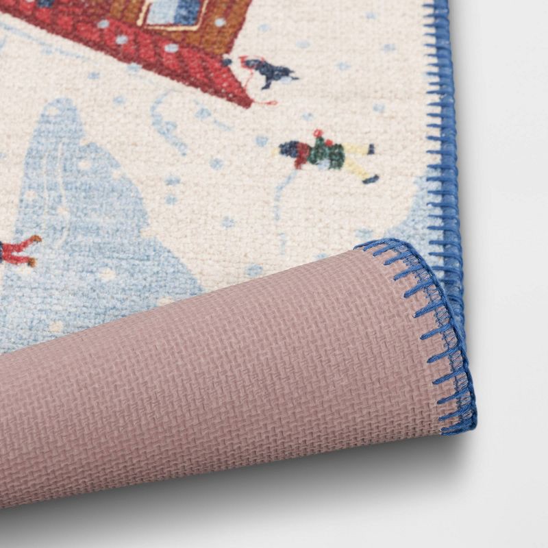 slide 4 of 4, 20"x34" Winter Skiing and Skating with Chalet Scatter Rug Blue - Room Essentials™, 1 ct