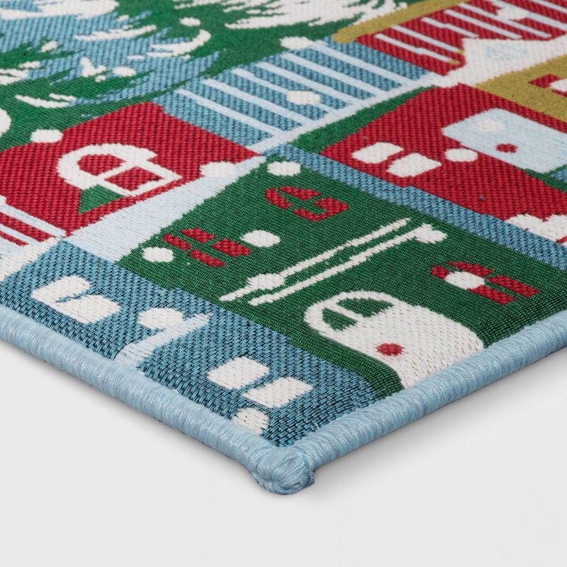 slide 3 of 4, 20"x34" Winter Snowy Houses Memory Foam Rug Blue - Room Essentials™, 1 ct