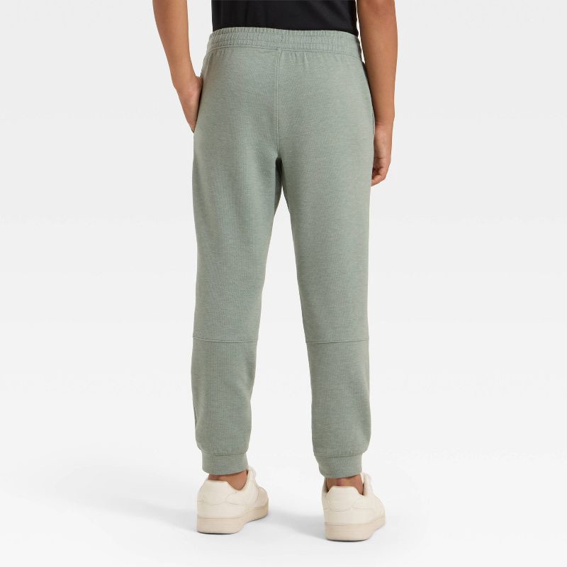 slide 2 of 3, Boys' Spacer Jogger Sweatpants - All In Motion™ Sage Green L, 1 ct