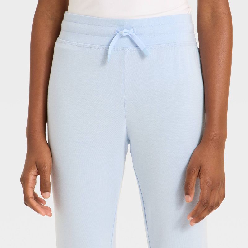 slide 3 of 3, Girls' Modal French Terry Flare Pants - All In Motion™ Sky Blue M, 1 ct