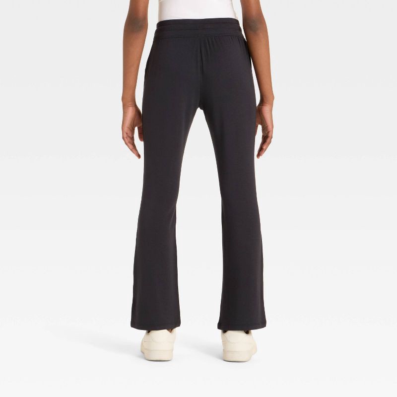 slide 2 of 3, Girls' Modal French Terry Flare Pants - All In Motion™ Black S, 1 ct