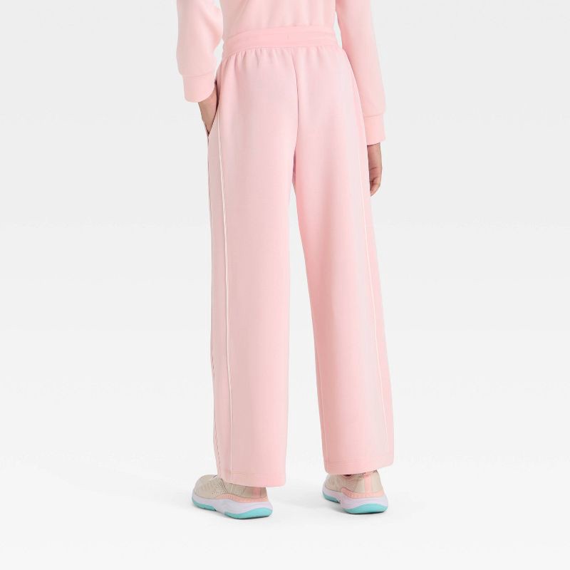 slide 2 of 3, Girls' Airy Sleek Wide Leg Pants - All In Motion™ Light Pink L, 1 ct