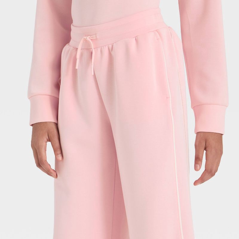slide 3 of 3, Girls' Airy Sleek Wide Leg Pants - All In Motion™ Light Pink L, 1 ct