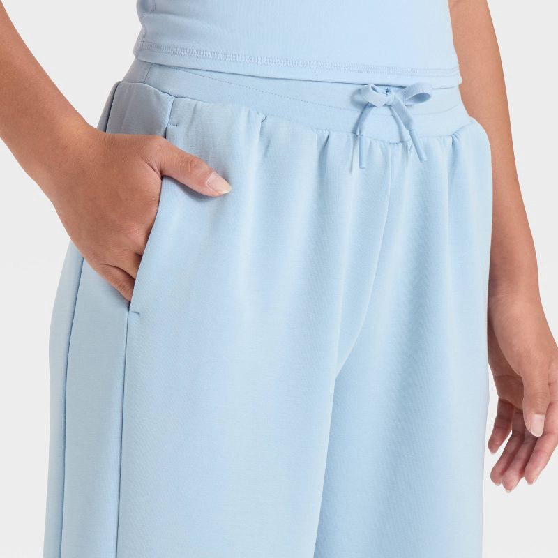 slide 3 of 3, Girls' Airy Sleek Wide Leg Pants - All In Motion™ Light Blue XL, 1 ct