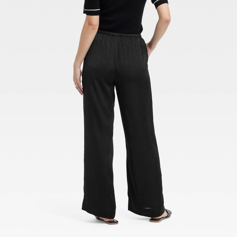 slide 2 of 3, Women's Mid-Rise Straight Leg Crinkle Satin Pull-On Pants - A New Day™ Black XS: Side Pocket, 1 ct