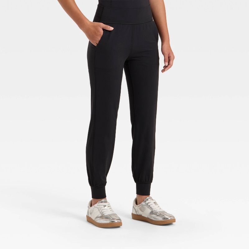 slide 1 of 3, Girls' Everyday Soft Jogger Leggings - All In Motion™ Black M, 1 ct