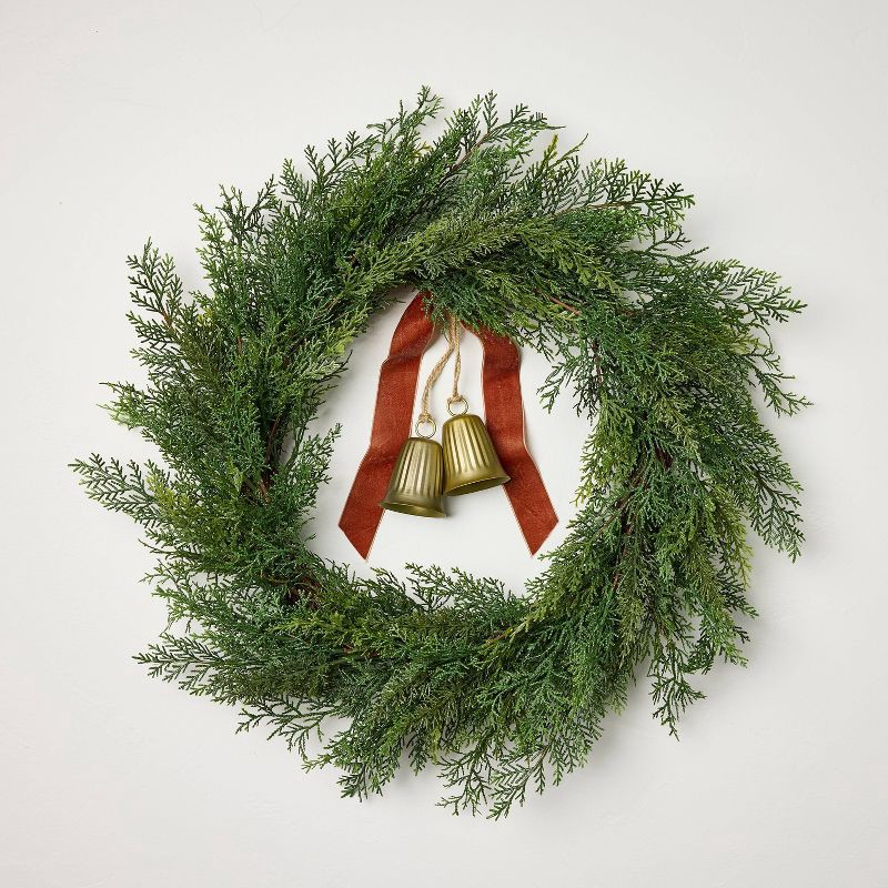slide 1 of 3, Hearth & Hand with Magnolia 26" Cypress with Brass Bell and Red Ribbon Christmas Wreath - Hearth & Hand™ with Magnolia, 1 ct