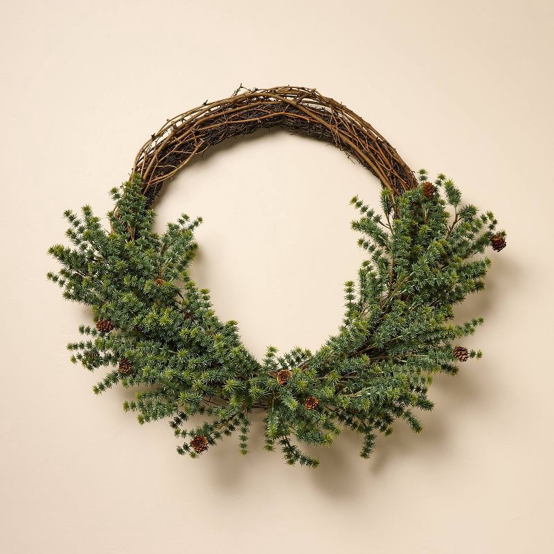 slide 1 of 3, Hearth & Hand with Magnolia 22" Asymmetrical Pine with Pinecone Christmas Wreath - Hearth & Hand™ with Magnolia, 1 ct
