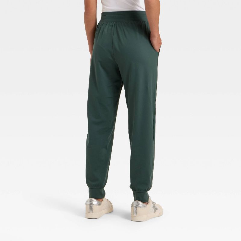 slide 2 of 3, Girls' Soft Stretch Jogger Pants - All In Motion™ Dark Green S, 1 ct