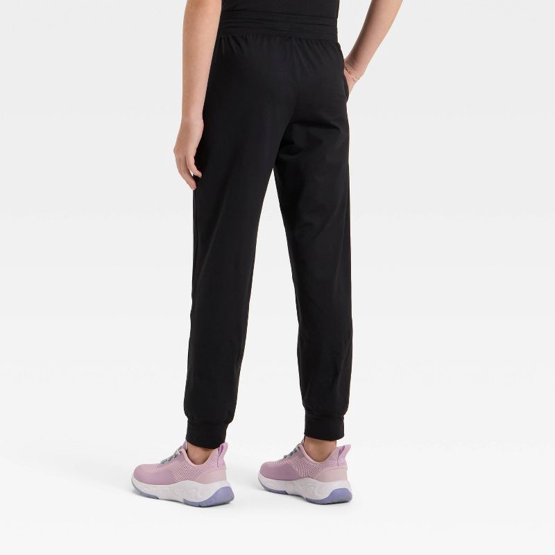 slide 2 of 3, Girls' Soft Stretch Jogger Pants - All In Motion™ Black L, 1 ct