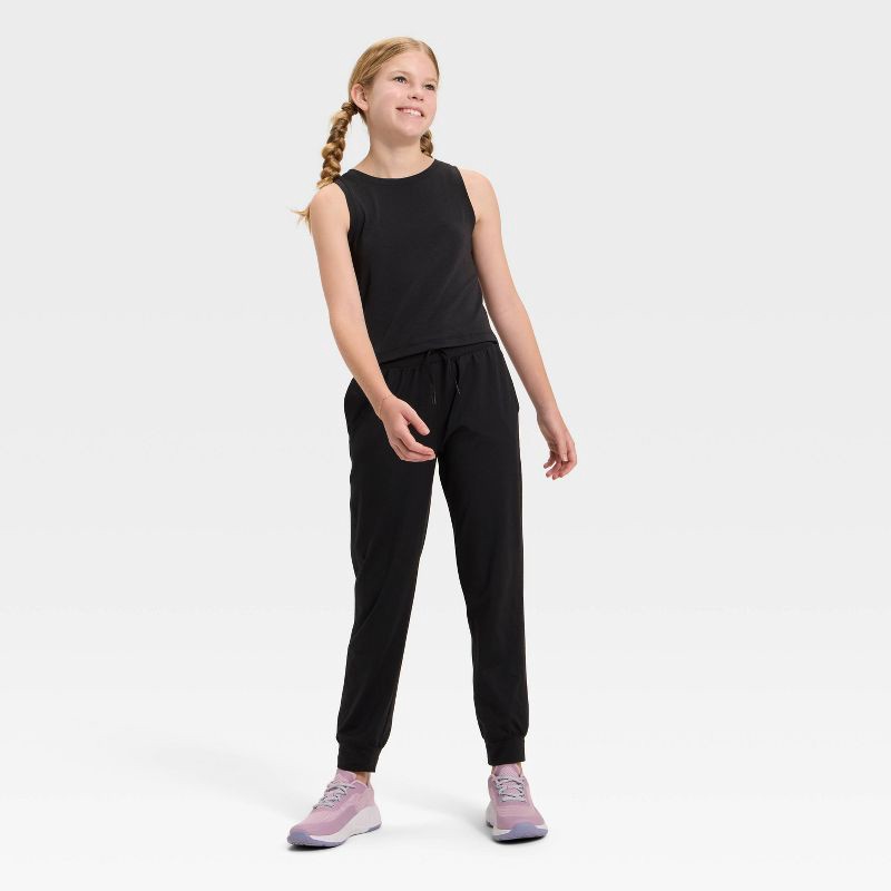 slide 3 of 3, Girls' Soft Stretch Jogger Pants - All In Motion™ Black L, 1 ct