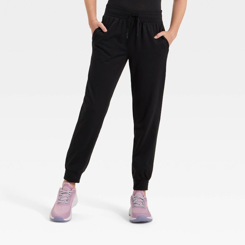 slide 1 of 3, Girls' Soft Stretch Jogger Pants - All In Motion™ Black L, 1 ct