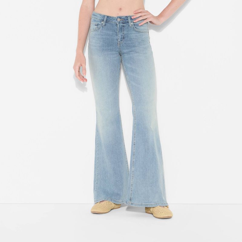 slide 2 of 3, Women's Mid-Rise Flare Jeans - Wild Fable™ Light Wash 10, 1 ct