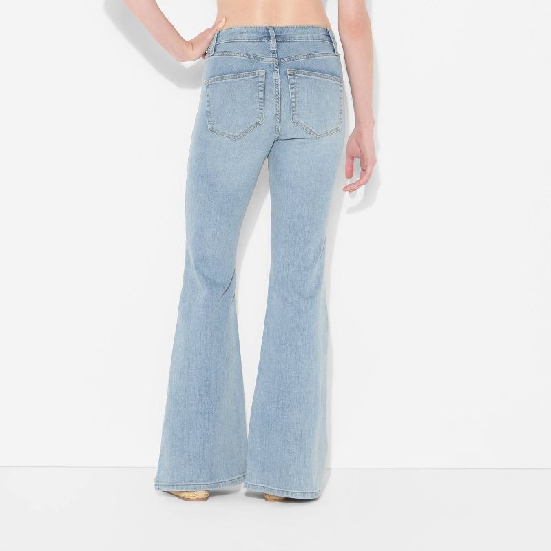 slide 3 of 3, Women's Mid-Rise Flare Jeans - Wild Fable™ Light Wash 10, 1 ct