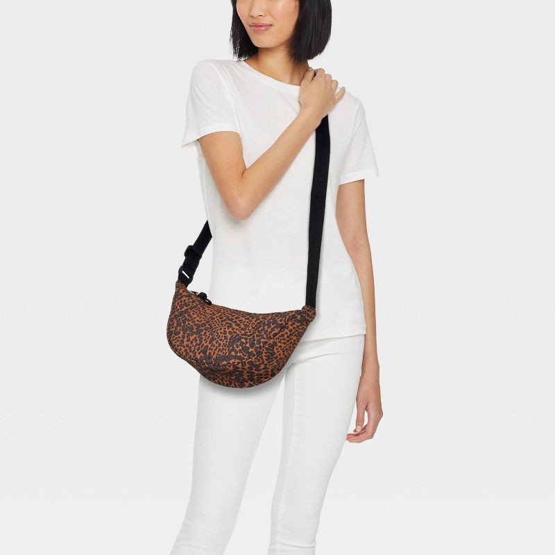slide 2 of 5, Essential Crescent Sling Crossbody Bag - Universal Thread™ Leopard, 1 ct