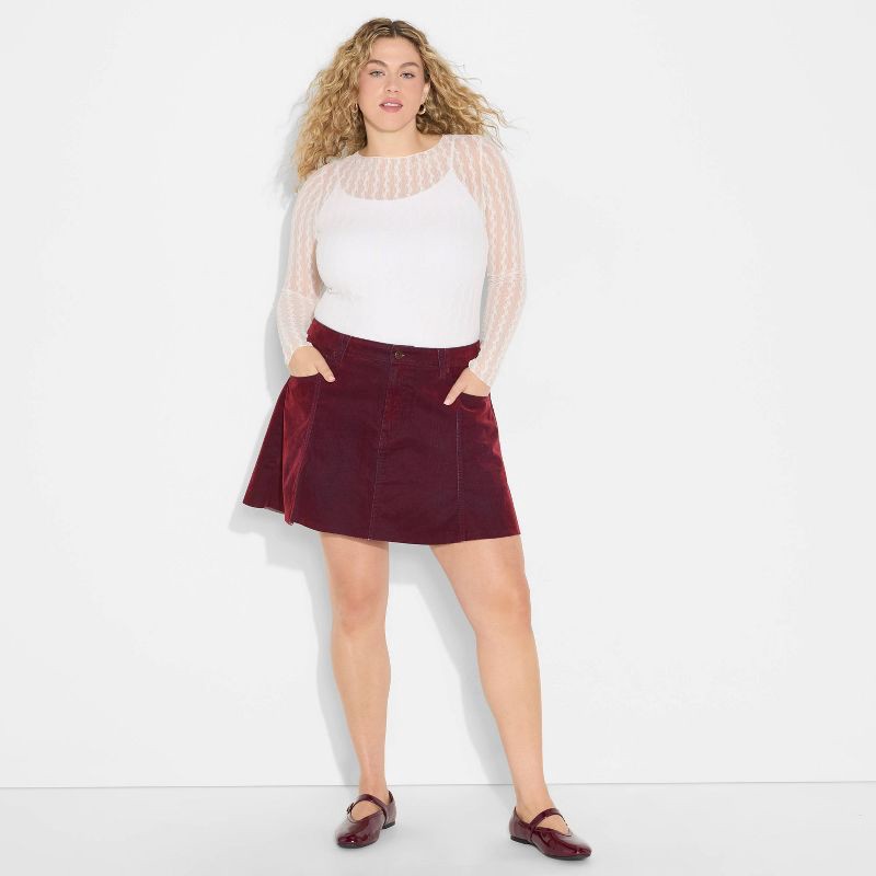 slide 1 of 3, Women's Pocket Flare Mini Denim Skirt - Wild Fable™ Burgundy 17, 1 ct