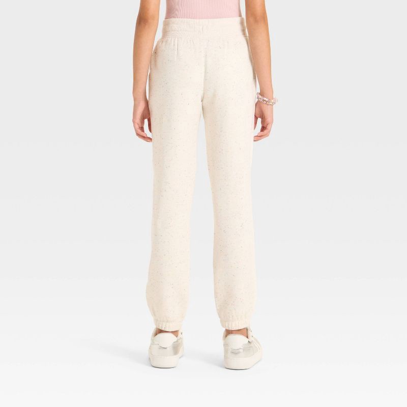 slide 2 of 3, Girls' Fleece Jogger Pants - Cat & Jack™ Cream M, 1 ct