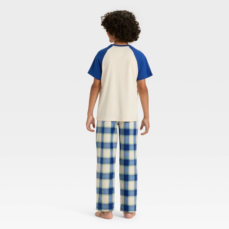 slide 3 of 4, Boys' Short Sleeve T-Shirt and Plaid Fleece Pants Pajama Set - Cat & Jack™ Cream/Blue XL, 1 ct