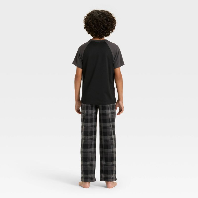 slide 3 of 4, Boys' Short Sleeve T-Shirt and Plaid Fleece Pants Pajama Set - Cat & Jack™ Black L, 1 ct