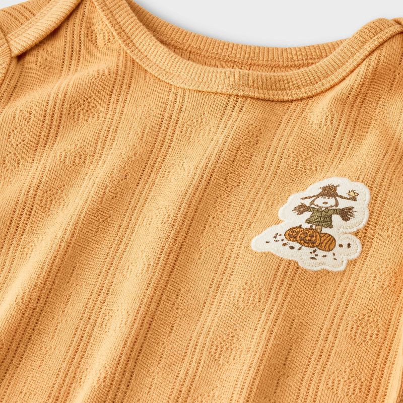 slide 8 of 9, Baby 2pc Little Snoopy Halloween Long Sleeve Bodysuit & Bottom Set - Orange 6-9M, 2 ct