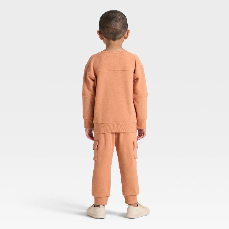 slide 3 of 4, Toddler Boys' Pocket Crewneck Sweatshirt and Joggers Set - Cat & Jack™ Orange 5T, 1 ct