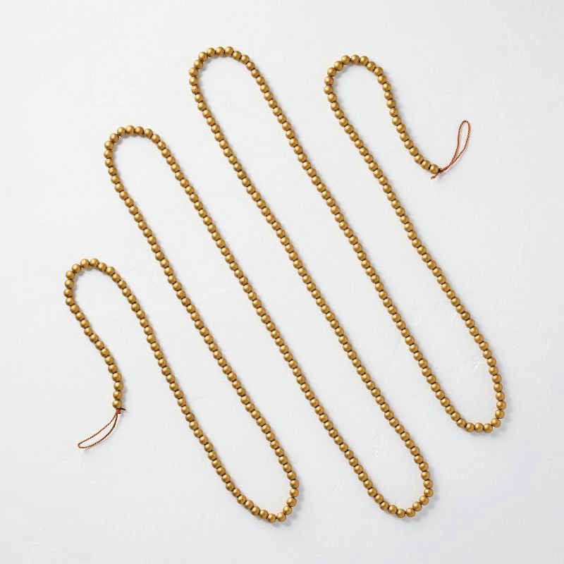 slide 1 of 3, Hearth & Hand with Magnolia 12' Brass Bead Garland - Hearth & Hand™ with Magnolia, 1 ct