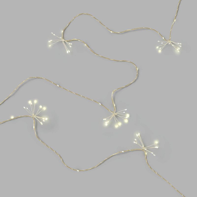 slide 3 of 4, 130 LED Starburst Indoor Outdoor Fairy String Lights White - Threshold™, 1 ct