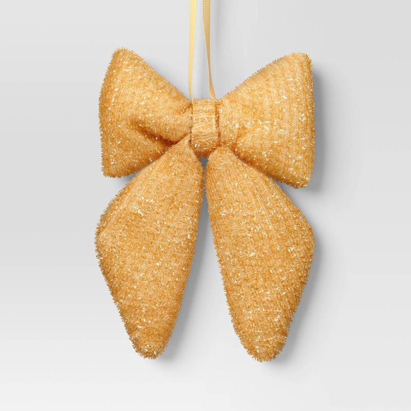 slide 1 of 3, 6.5" Christmas Tinsel Bow Ornament Gold - Wondershop™, 1 ct