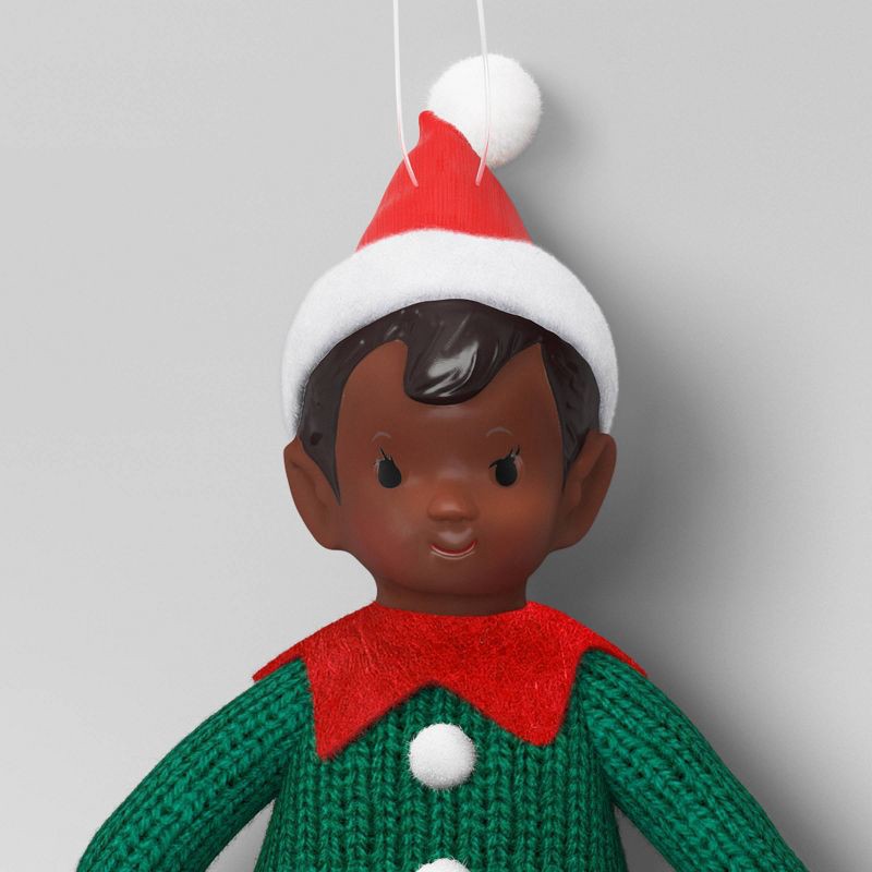 slide 3 of 3, Christmas Fabric Elf Child with Red Hat and Green Sweater Ornament - Wondershop™, 1 ct