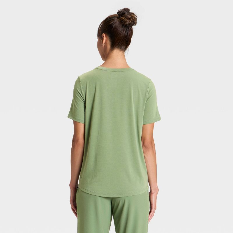 slide 4 of 5, Women's Crewneck Leggings Friendly Short Sleeve T-Shirt - All In Motion™ Olive Green M, 1 ct