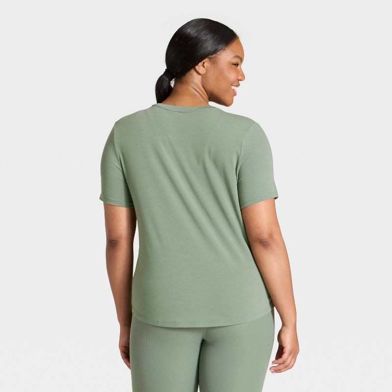 slide 3 of 5, Women's Crewneck Leggings Friendly Short Sleeve T-Shirt - All In Motion™ Olive Green M, 1 ct