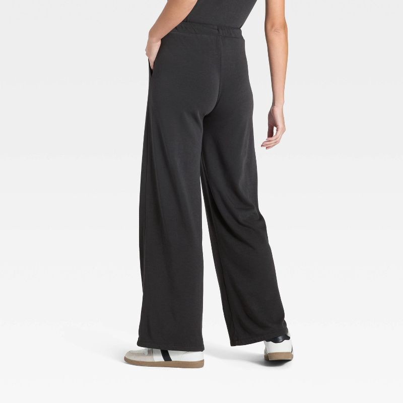 slide 2 of 3, Women's High-Rise Fleece Wide Leg Sweatpants - Universal Thread™ Black XL, 1 ct