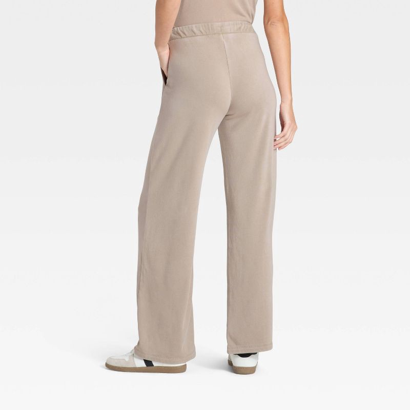 slide 2 of 3, Women's High-Rise Fleece Wide Leg Sweatpants - Universal Thread™ Tan M, 1 ct