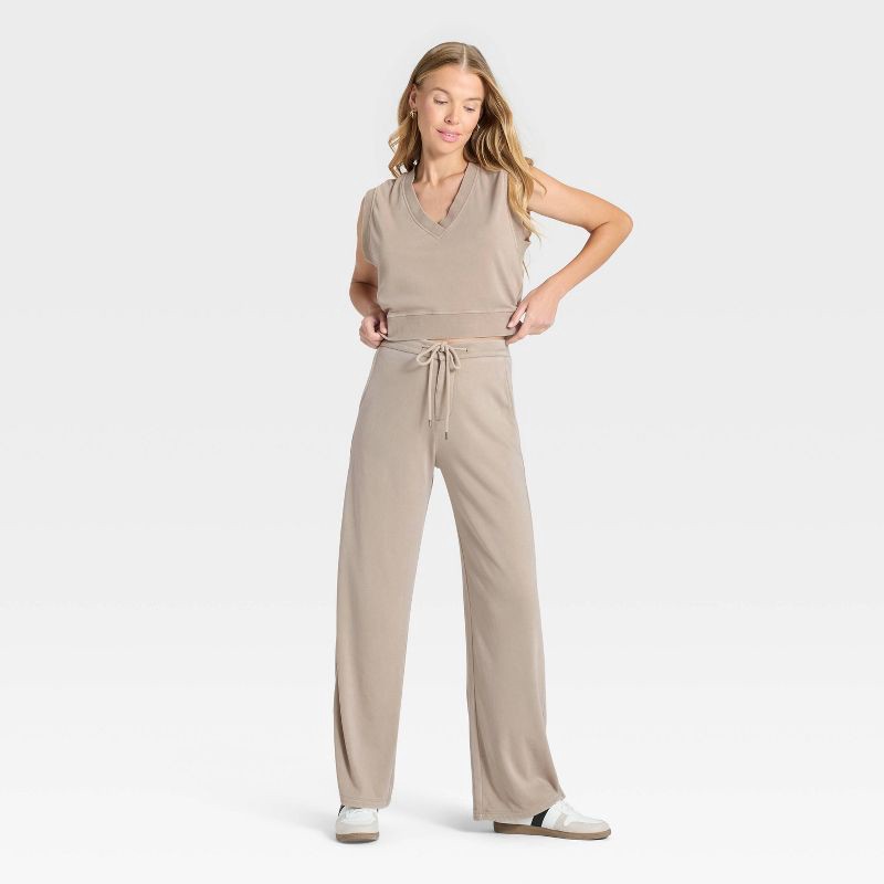 slide 3 of 3, Women's High-Rise Fleece Wide Leg Sweatpants - Universal Thread™ Tan L, 1 ct