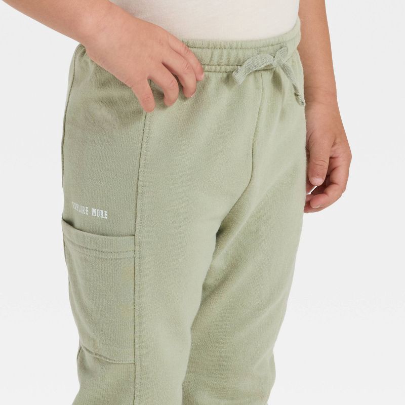 slide 3 of 4, Toddler Boys' Washed French Terry Jogger Pants - Cat & Jack™ Olive Green 12M, 1 ct