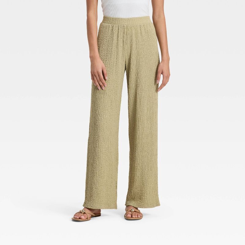 slide 1 of 3, Women's Mid-Rise Textured Pull-On Pants - A New Day™ Light Green S, 1 ct