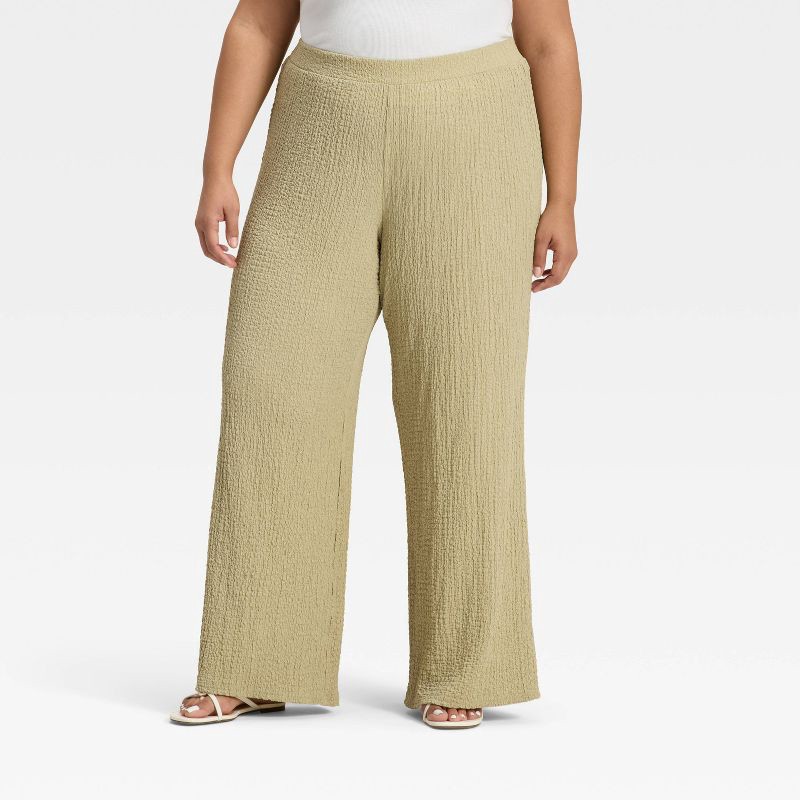 slide 1 of 3, Women's Mid-Rise Textured Pull-On Pants - A New Day™ Light Green XXL, 1 ct