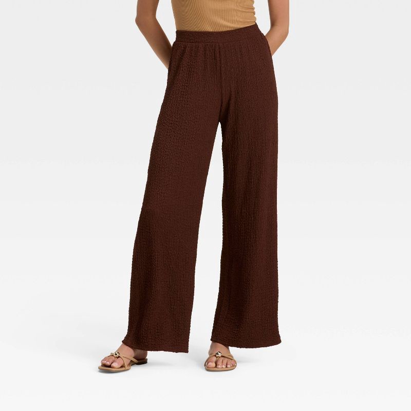 slide 1 of 3, Women's Mid-Rise Regular Fit Textured Pull-On Pants - A New Day™ Brown L, 1 ct